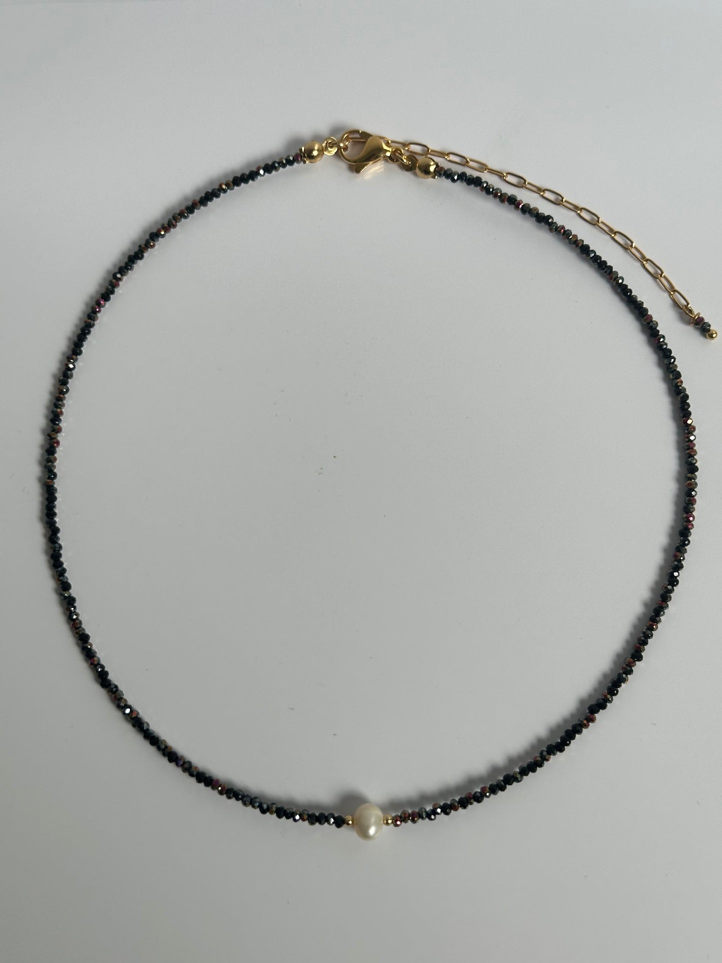 Glanzend kristalglas ketting met een zoetwaterparel 30%
